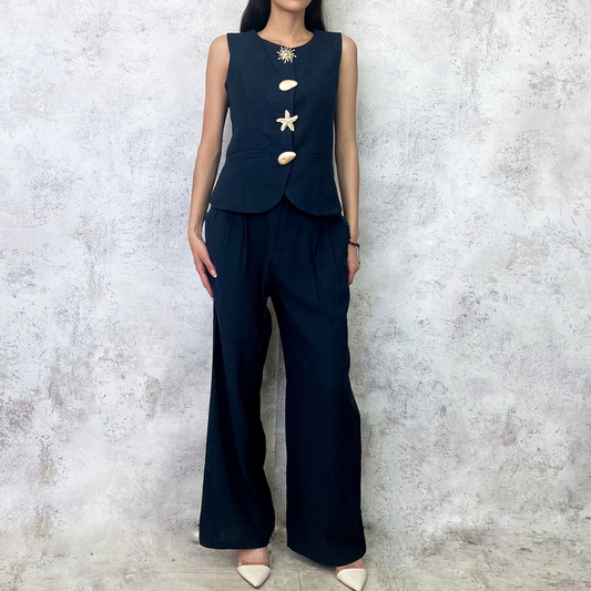 Conjunto de chaleco y pantalón con botones de figuras azul