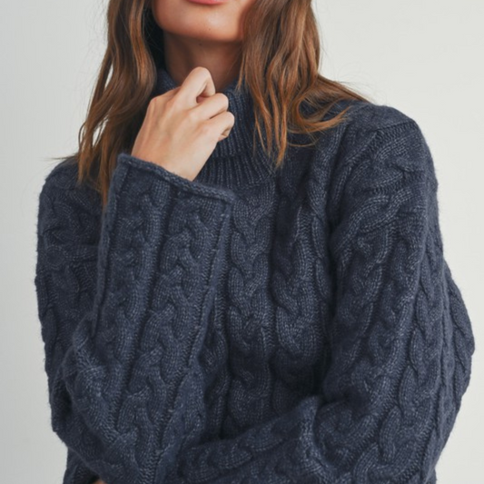 Suéter azul punto trenzado