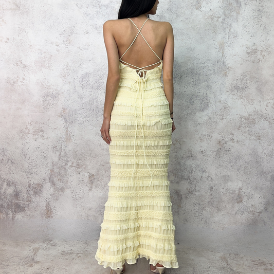 Vestido midi con olanes amarillo pastel