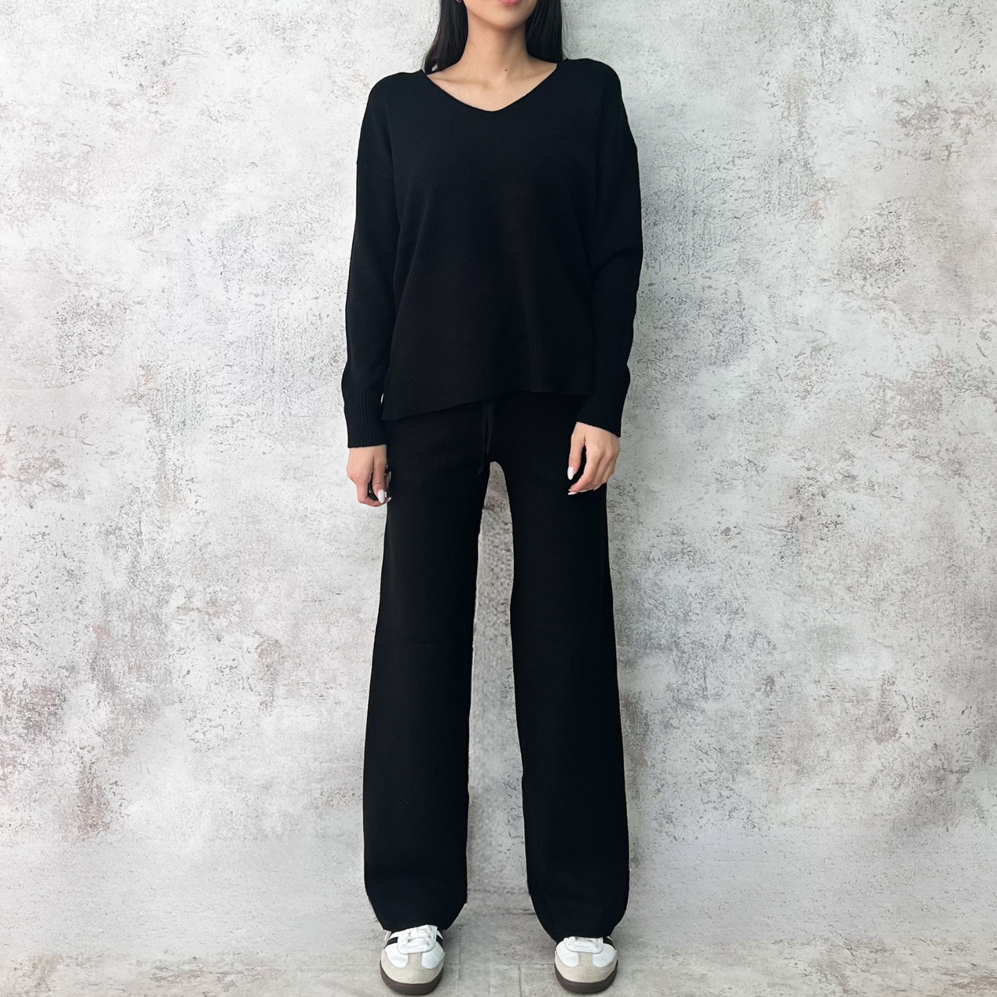 Set tejido negro cuello V