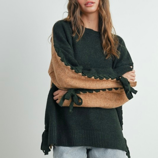 Suéter en color verde trenzado en mangas