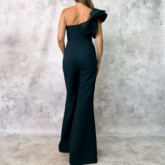 Jumpsuit verde strapless con maxi detalle floral.