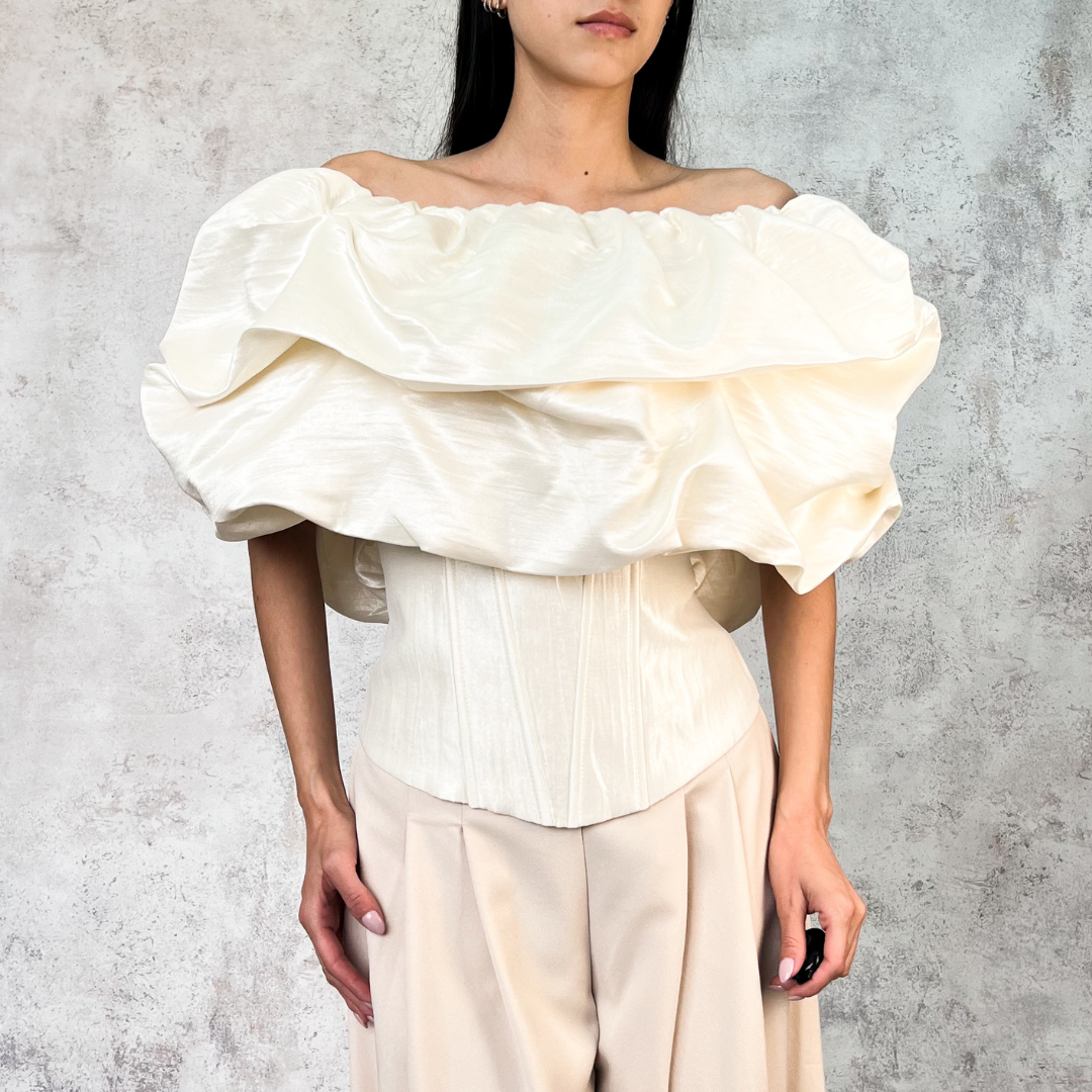 Blusa tipo globo perla