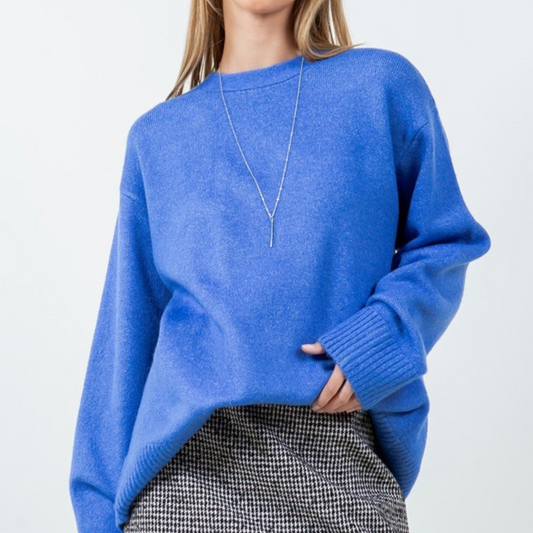 Suéter azul con escote en espalda