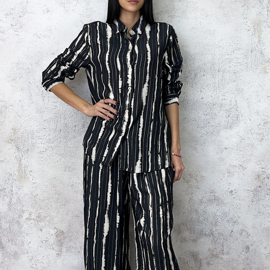 Conjunto estampado de hilo dorado negro