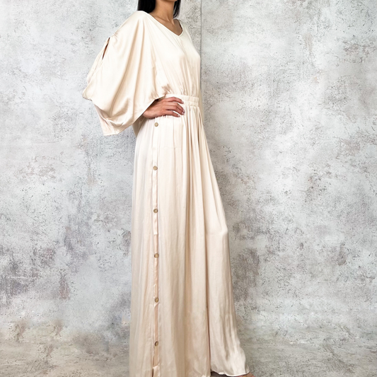 Jumpsuit beige aberturas en piernas
