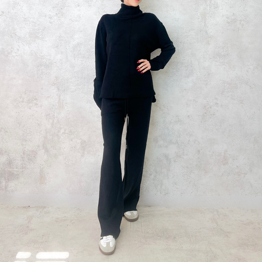 Set de punto negro en cuello alto cárdigan largo