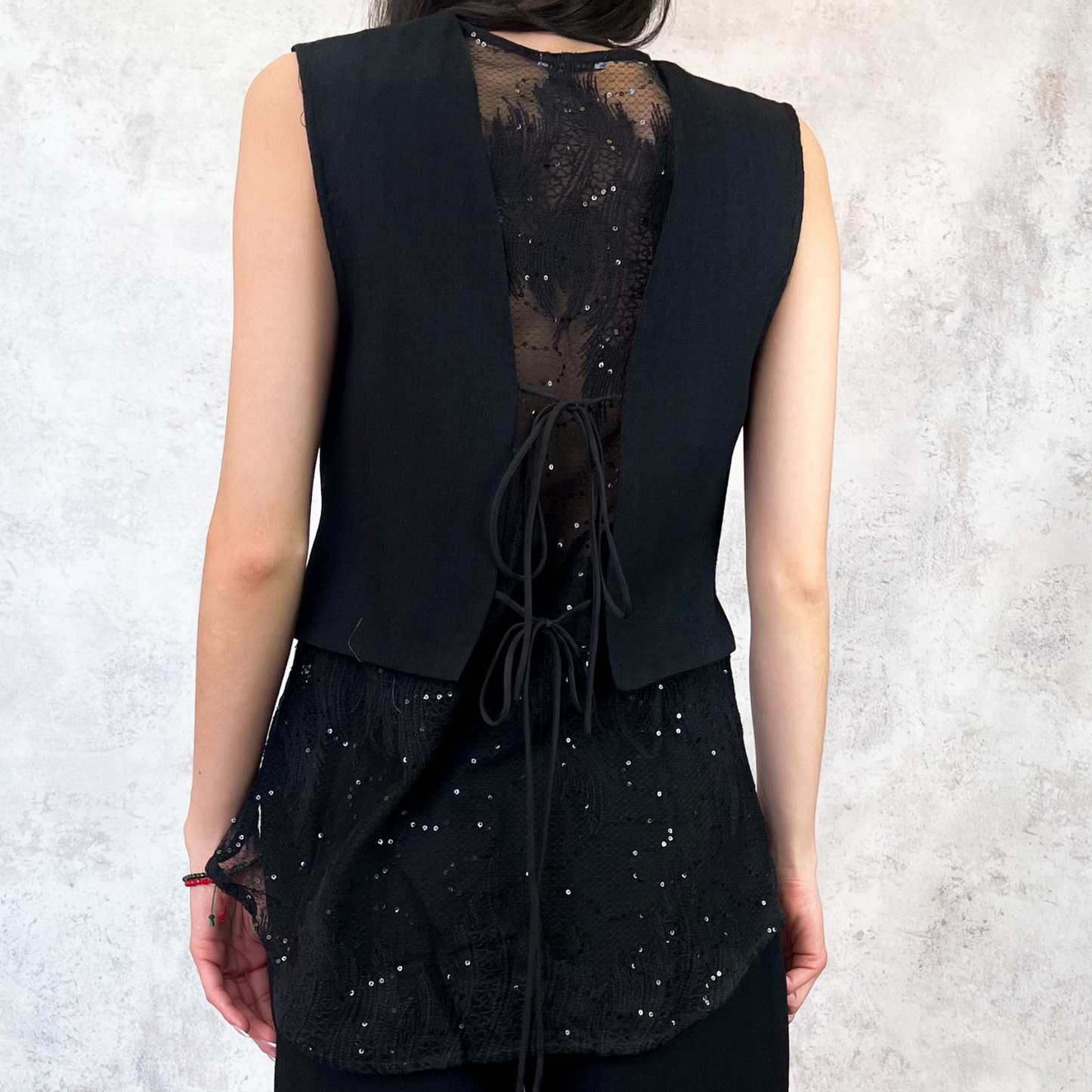 Conjunto chaleco y pantalón encaje negro