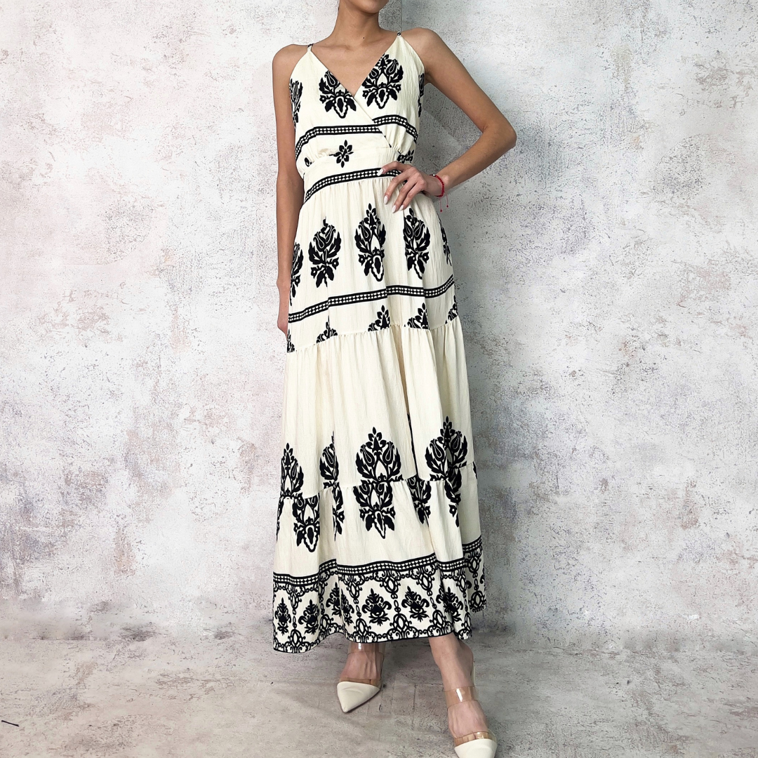 Vestido en corte midi tirantes estampado negro