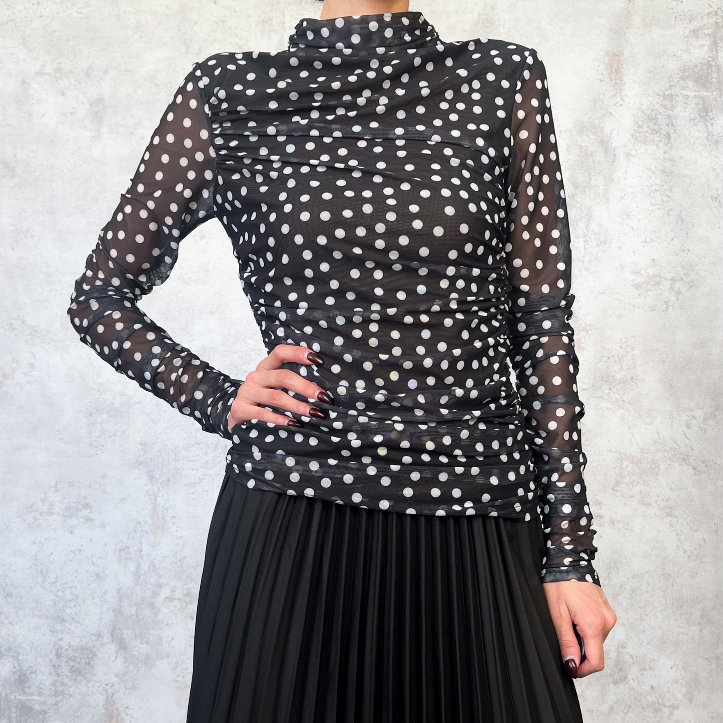 Blusa polka dots negra