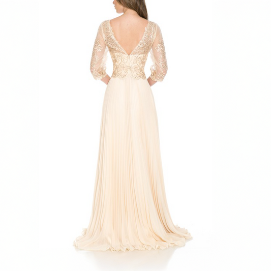 Vestido largo tableado champagne.