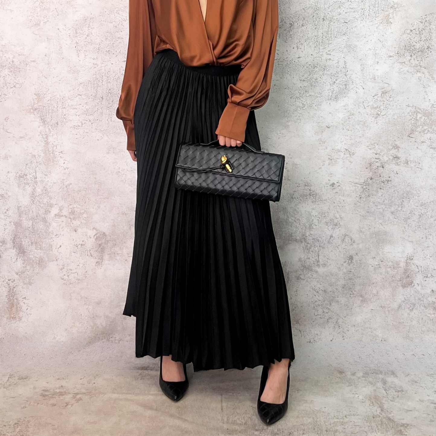 Falda midi negra tableada