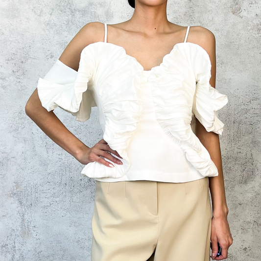 Blusa plisada blanca