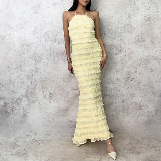 Vestido midi con olanes amarillo pastel