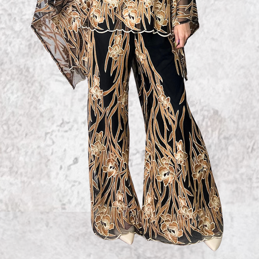 Pantalon negro estampado flores con bordado café