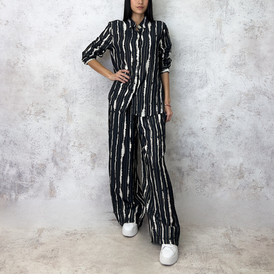 Conjunto estampado de hilo dorado negro