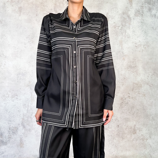 Conjunto negro con rayas blancas