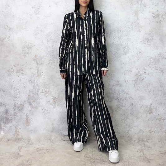 Conjunto estampado de hilo dorado negro