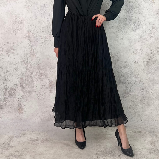 Falda midi plisada negra