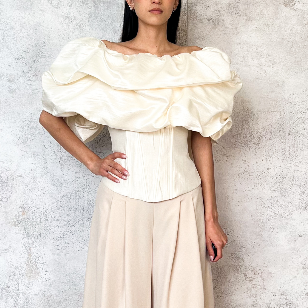 Blusa tipo globo perla