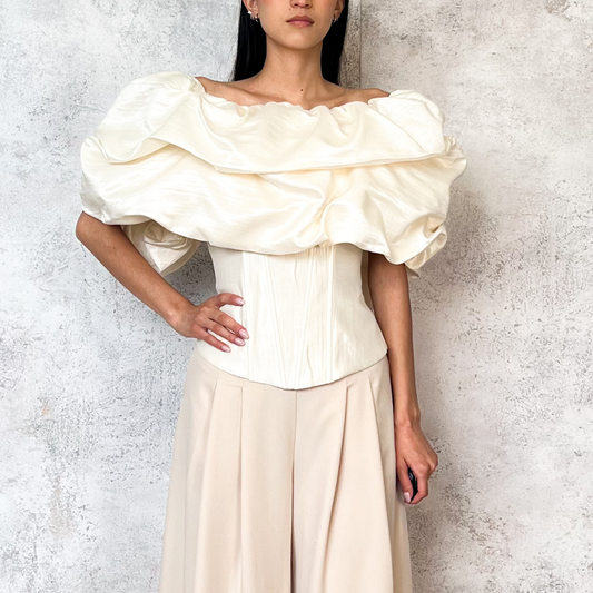 Blusa tipo globo perla