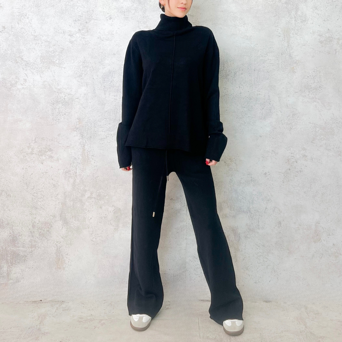 Set de punto negro en cuello alto cárdigan largo