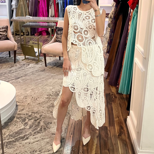 Set falda y blusa asimétrica crochet blanco.