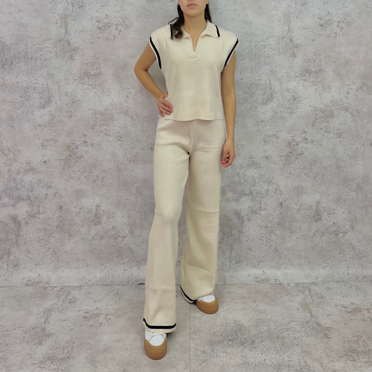 Set de punto blusa manga corta beige.