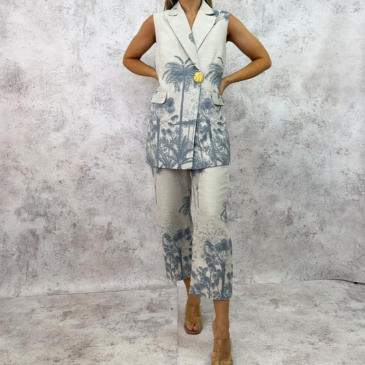 Set chaleco y pantalón gris/azul.
