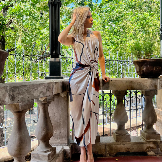 Vestido midi beige estampado colores.
